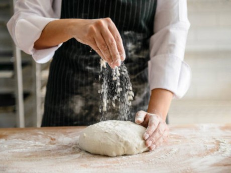 Making of a sourdough bread in a bakery